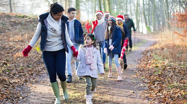 The Ramblers' Winter Walking Festival: large family group on a walk in a forest